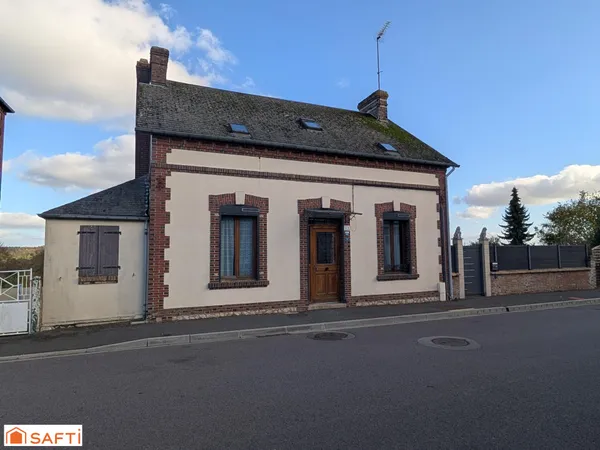 Maison de ville avec jardin et garages, proche commerces et écoles
