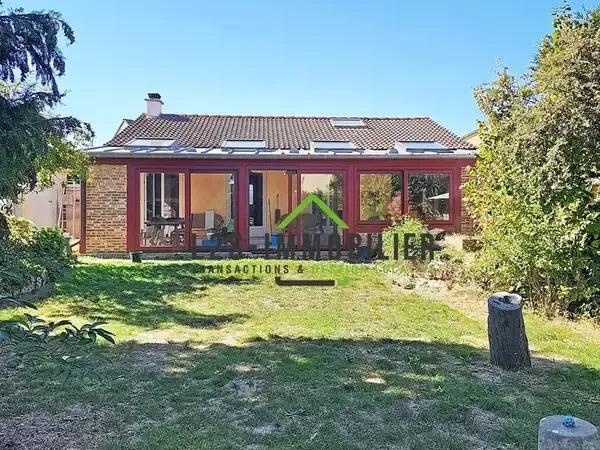 Baillet en france maison plain pied f3/f4 avec veranda et double garage !