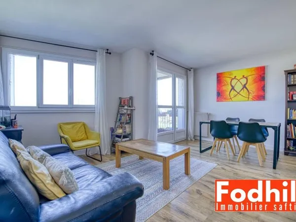 Appartement 4 pièces de 75 m² avec cave et parking en sous-sol.