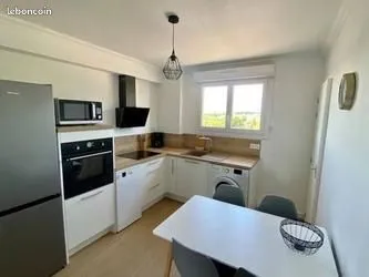 Appartement lumineux 3ch + balcon + garage privé