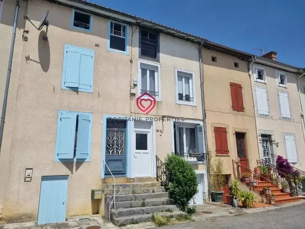 Petit maison de ville compacte joliment rénovée avec cuisine d'été.