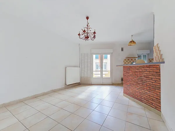 Une charmante maison de village T4 avec garage, idéalement située au coeur d'Hérépian.