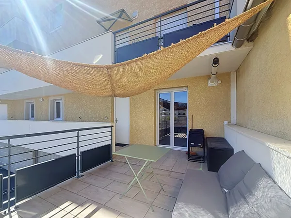 Bel Appartement Centre Meximieux 2 pièce(s) 56.45 m2 avec terrasse et balcon et stationnement couver