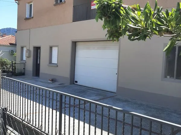 Maison 4 faces avec garage