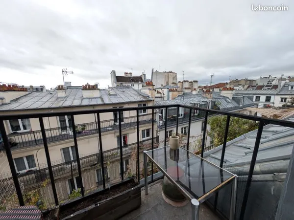Beau studio avec Balcon exposé plein sud - Vue panoramique sur les toits