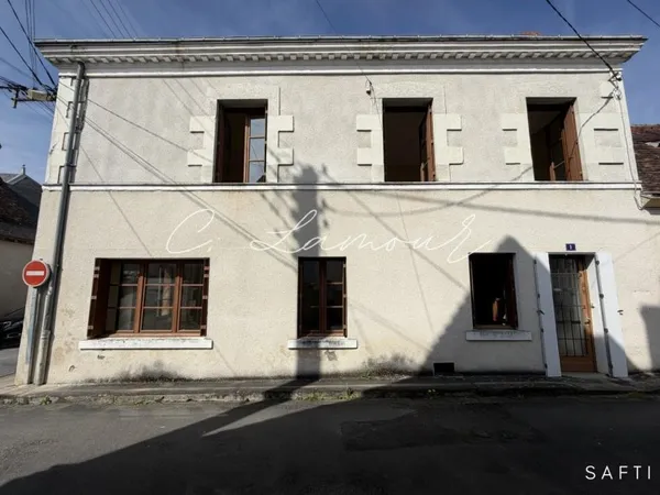 Maison de ville et jardin non attenant