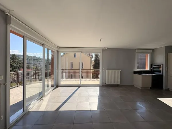 Appartement F4 - 88 m² avec terrasse, garage double et ascenseur