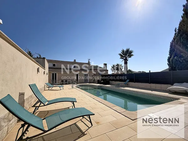 A vendre maison familiale de 7 pièces sur terrain de 980 m² avec piscine et garage au Domaine des Ol