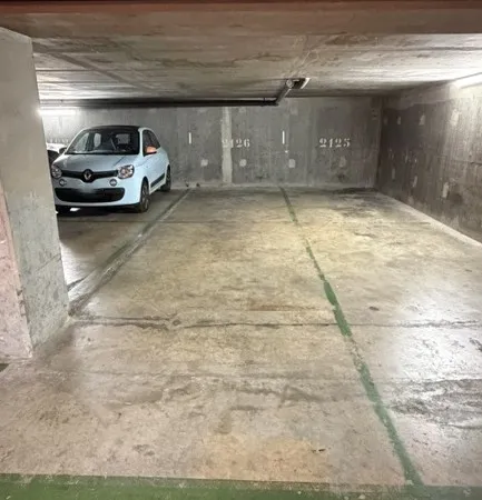 Loue 2 places de parking en enfilade
