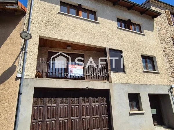 Maison centre ville avec balcon et garage