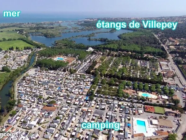 Vends terrain en copropriété + Mobile Home tout confort Mer Piscine Clim