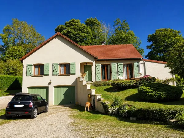 Joli pavillon tout confort dans son écrin de verdure