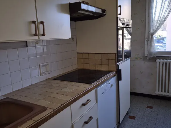 Appartement T3 avec balcon, cave et garage