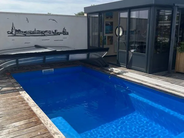 Maison de plain pied 132m2 avec piscine, véranda et garage