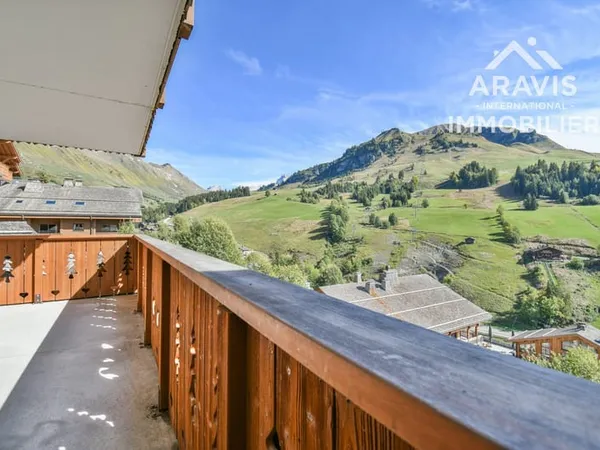 Bel appartement avec vue sur les pistes de ski