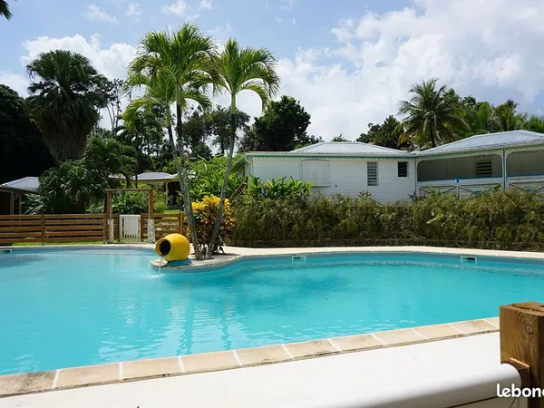 ​Investissement locatif clé en main - Charmant bungalow 2 chambres avec piscine et conciergerie