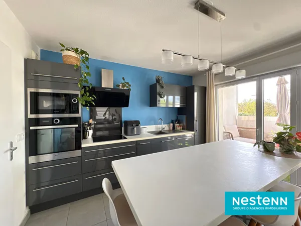 Appartement de type 4 de 74.70m² avec balcon et stationnement situé sur le secteur de Villeurbanne L