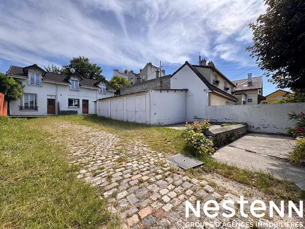 Maison divisée en deux appartements (103 m²) Quartier TREMBLAY