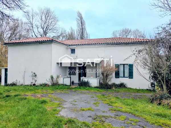 Ferme de caractère avec dépendances et beau potentiel