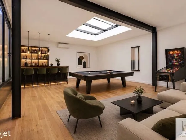 Loft d'exception de 226 m2 avec ascenseur privatif, patio, sous-sol de 100 m2 et garage 3 voitures à