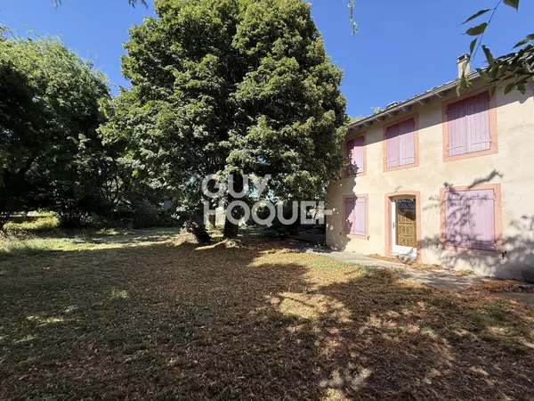 Bien d'exception en centre-ville : 175 m² habitables, jardin de 1 092 m² et garage double